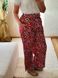 Pantalon fluide imprimé fleuri rouge